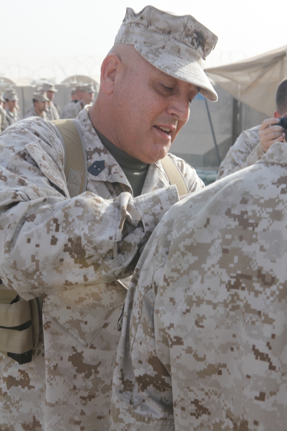Marine father promotes Marine son in Afghanistan