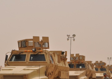 Soldiers prepare to ground guide their MRAPs
