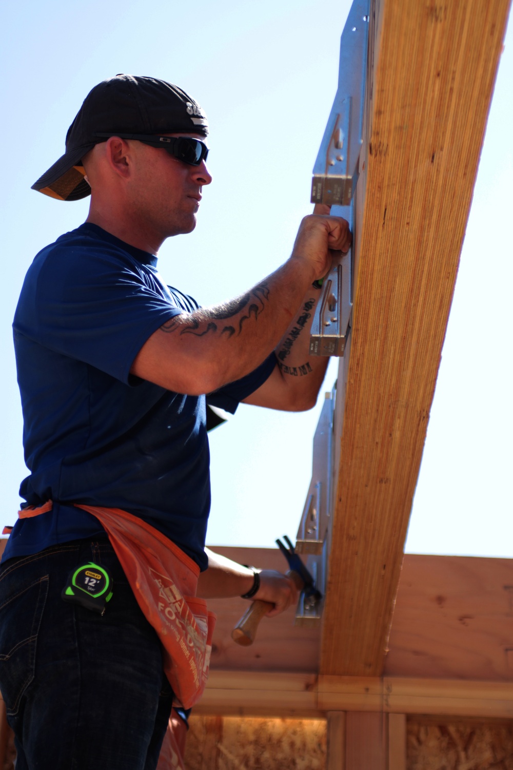 Kilo Company builds homes through Habitat for Humanity