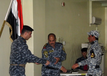 End of an era: 'Longknife' Squadron advisers see final class graduate before complete turnover of police training academy to Iraqis