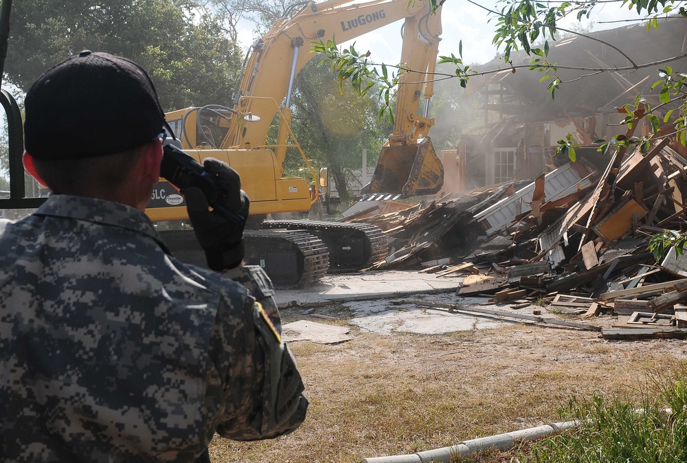 Guard task force aids city of Harlingen in drug house demolition