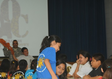 Guard soldiers teach Harlingen school children about dangers of drug use.