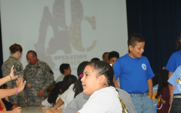 Guard soldiers teach Harlingen school children about dangers of drug use.