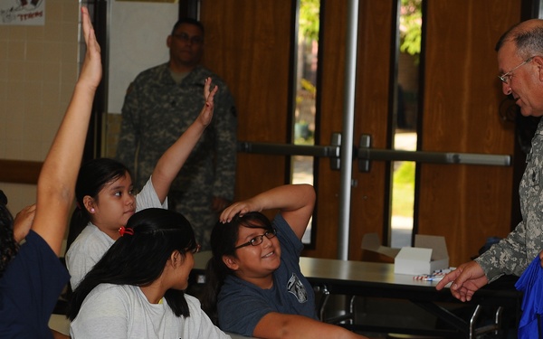 Guard soldiers teach Harlingen school children about dangers of drug use.