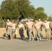 Soldiers from the 961st Engineer Battalion race towards the finish line