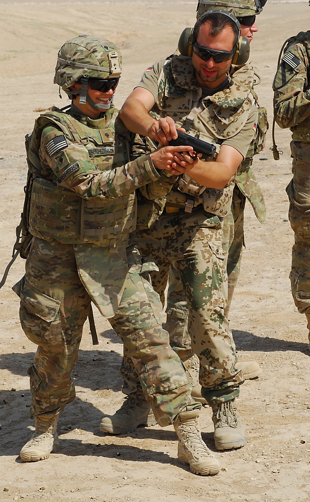 Air Cavalry troopers take aim with German firepower during small arms range