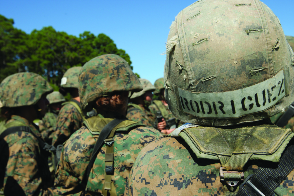 Karate instructor drop kicks recruit training