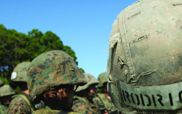 Karate instructor drop kicks recruit training