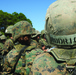 Karate instructor drop kicks recruit training