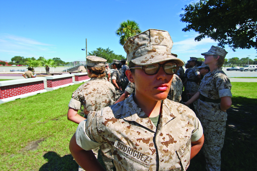Karate instructor drop kicks recruit training