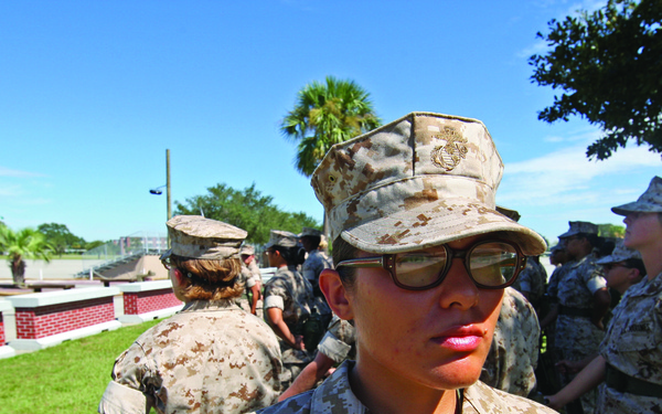 Karate instructor drop kicks recruit training