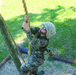 Karate instructor drop kicks recruit training