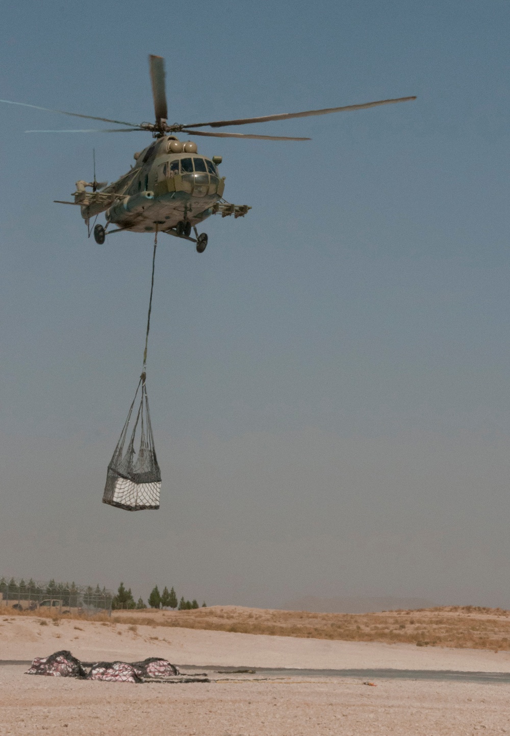 Kandahar Air Wing’s Mi-17s use sling loads to deliver supplies