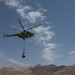 Kandahar Air Wing’s Mi-17s use sling loads to deliver supplies