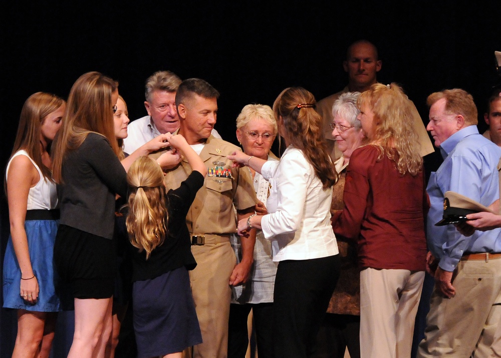 MESRON 8 sailor pinned by family and frieds during ceremony