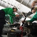 Aviation mechanics conduct routine maintenance