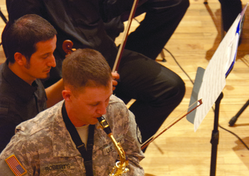 Army saxophonist plays with Kosovo Philharmonic Orchestra for 9/11