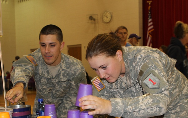 Gunfighters attend adopted school carnival
