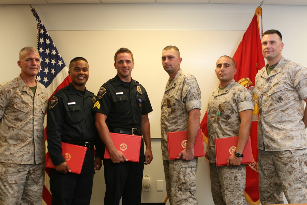 Civilian, military officers receive recognition