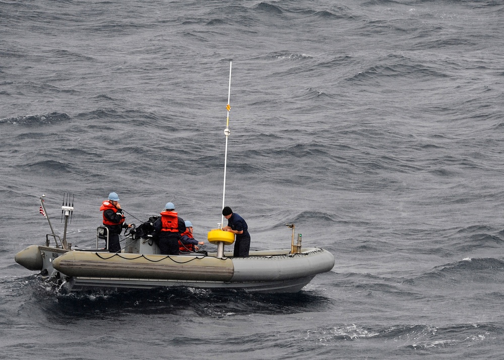 USS Arleigh Burke action