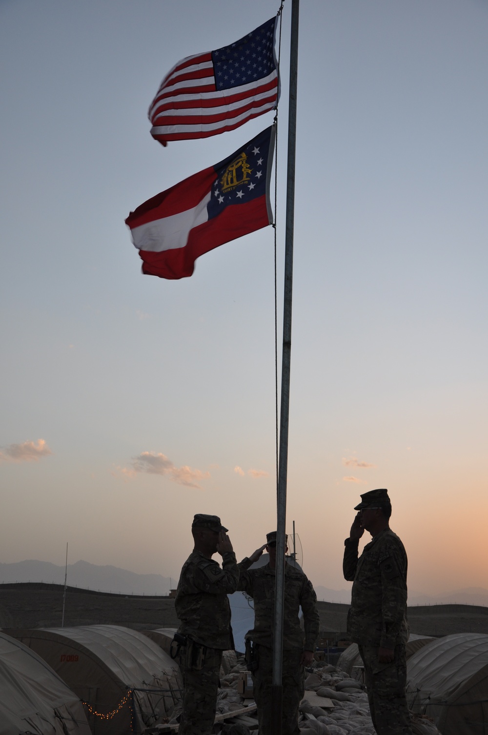 Flag ceremony at sunset