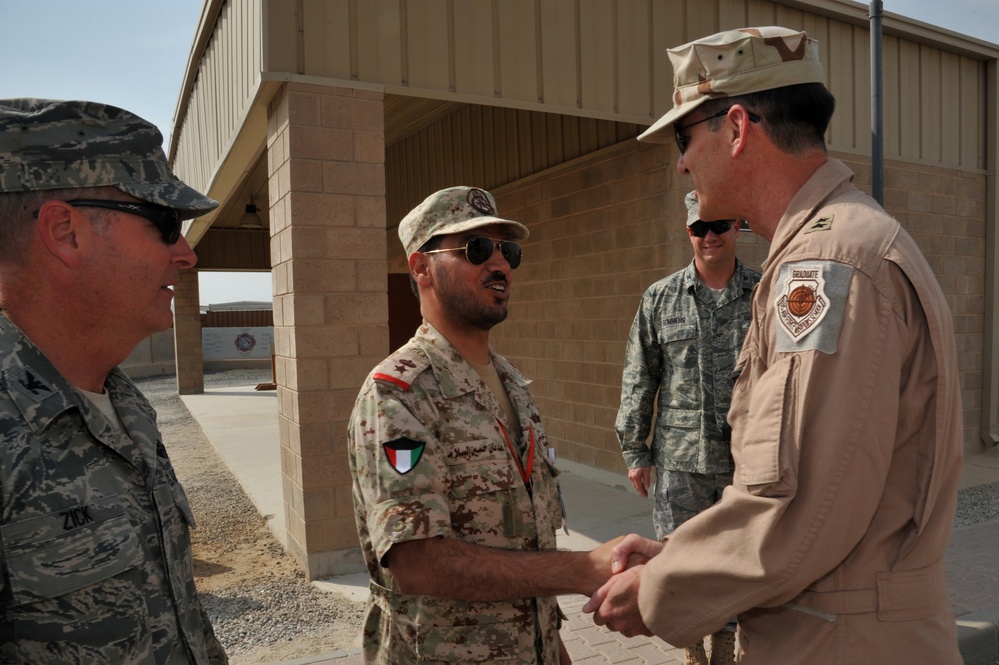 Maj. Gen. Jim Jones tours an undisclosed location in Southwest Asia