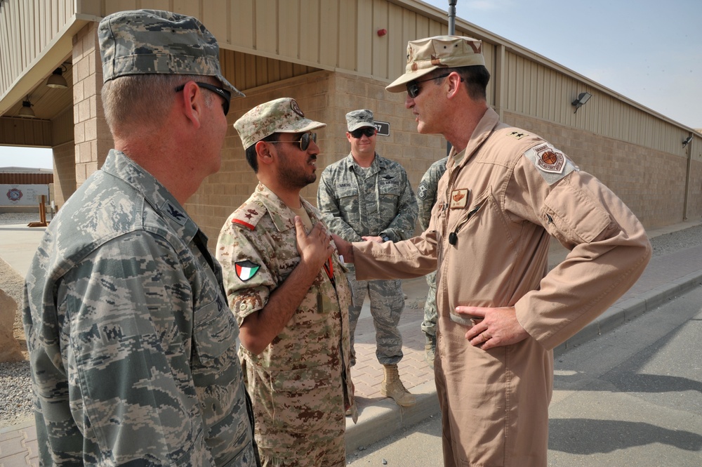 Maj. Gen. Jim Jones tours an undisclosed location in Southwest Asia