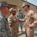 Maj. Gen. Jim Jones tours an undisclosed location in Southwest Asia