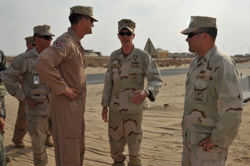 Maj. Gen. Jim Jones tours an undisclosed location in Southwest Asia