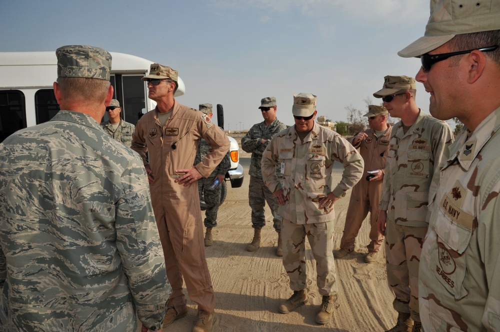 Maj. Gen. Jim Jones tours an undisclosed location in Southwest Asia