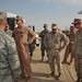Maj. Gen. Jim Jones tours an undisclosed location in Southwest Asia