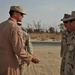 Maj. Gen. Jim Jones tours an undisclosed location in Southwest Asia