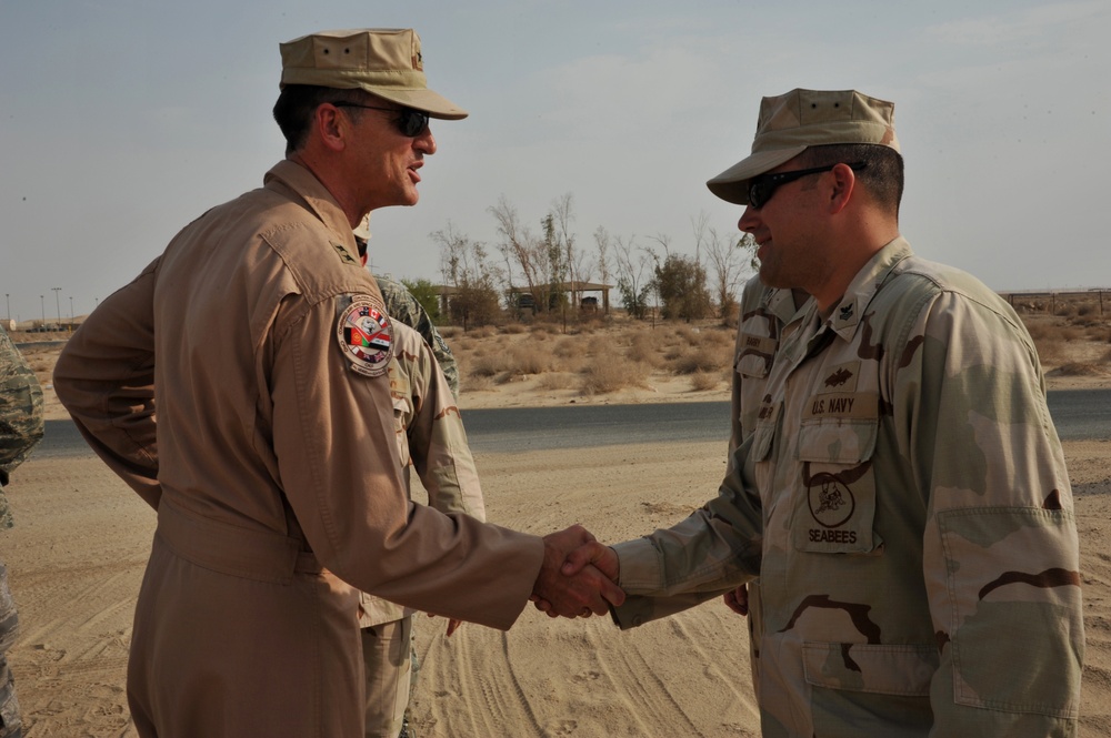 Maj. Gen. Jim Jones tours an undisclosed location in Southwest Asia