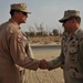 Maj. Gen. Jim Jones tours an undisclosed location in Southwest Asia