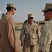 Maj. Gen. Jim Jones tours an undisclosed location in Southwest Asia