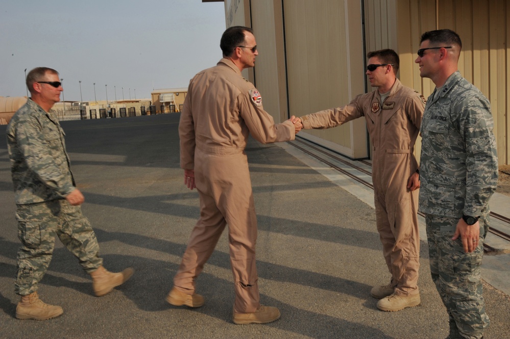 Maj. Gen. Jim Jones tours an undisclosed location in Southwest Asia