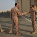 Maj. Gen. Jim Jones tours an undisclosed location in Southwest Asia