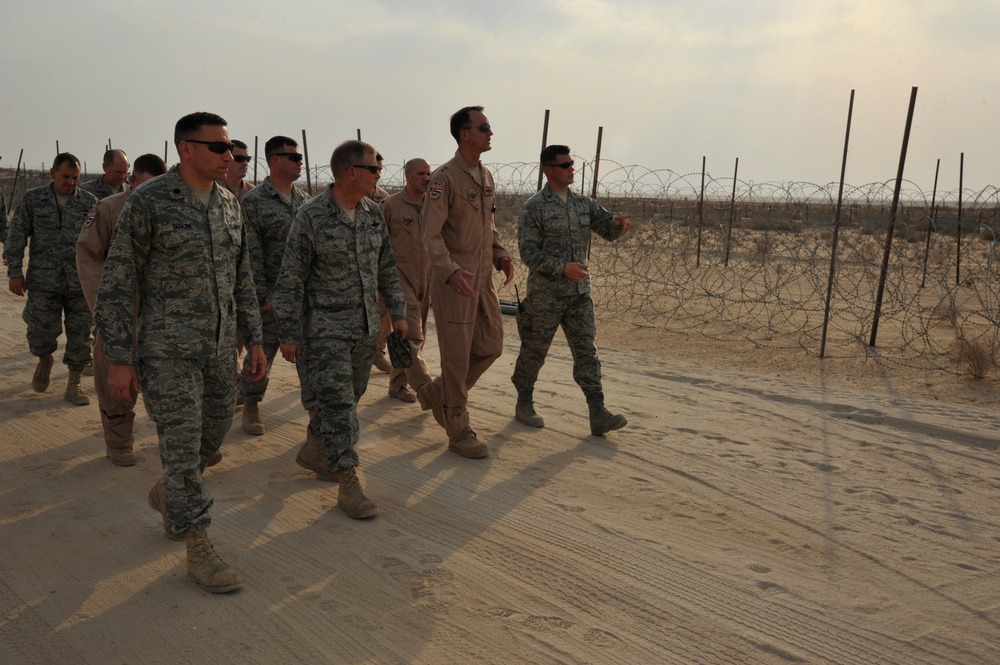 Maj. Gen. Jim Jones tours an undisclosed location in Southwest Asia