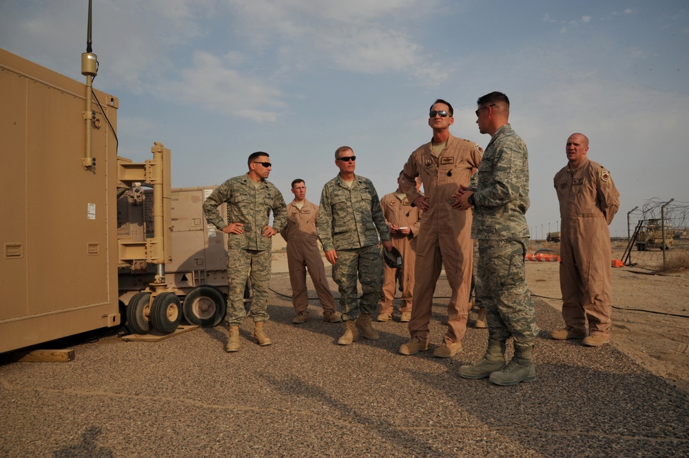 Maj. Gen. Jim Jones tours an undisclosed location in Southwest Asia