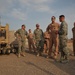 Maj. Gen. Jim Jones tours an undisclosed location in Southwest Asia