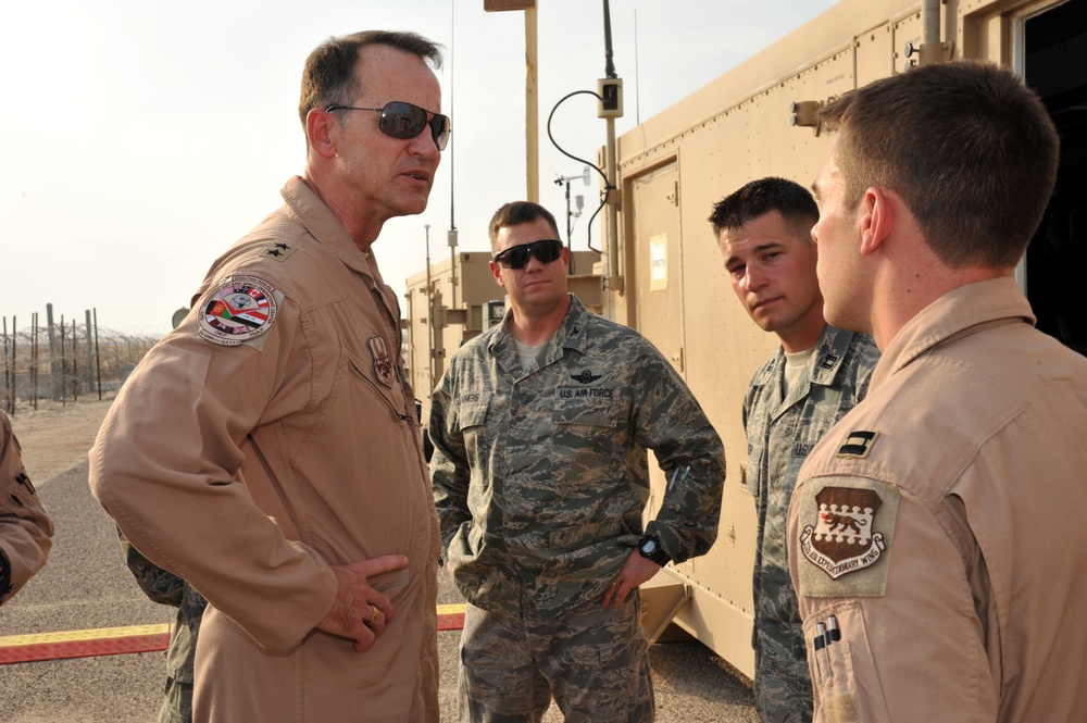 Maj. Gen. Jim Jones tours an undisclosed location in Southwest Asia
