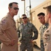 Maj. Gen. Jim Jones tours an undisclosed location in Southwest Asia