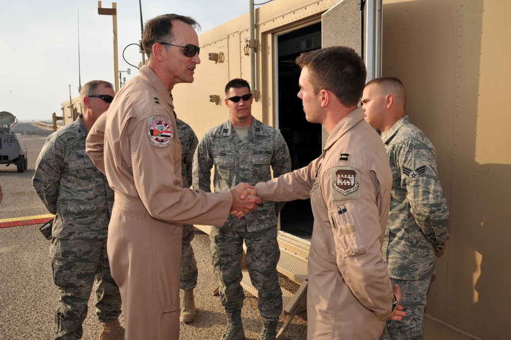 Maj. Gen. Jim Jones tours an undisclosed location in Southwest Asia
