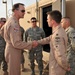 Maj. Gen. Jim Jones tours an undisclosed location in Southwest Asia
