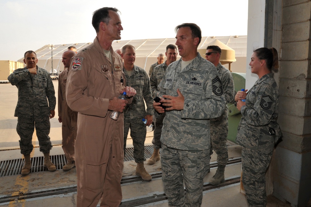 Maj. Gen. Jim Jones tours an undisclosed location in Southwest Asia