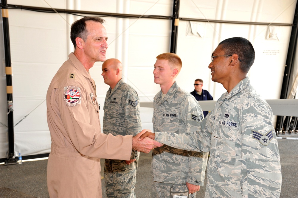 Maj. Gen. Jim Jones tours an undisclosed location in Southwest Asia