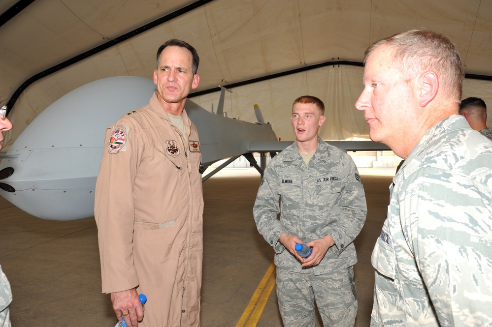 Maj. Gen. Jim Jones tours an undisclosed location in Southwest Asia