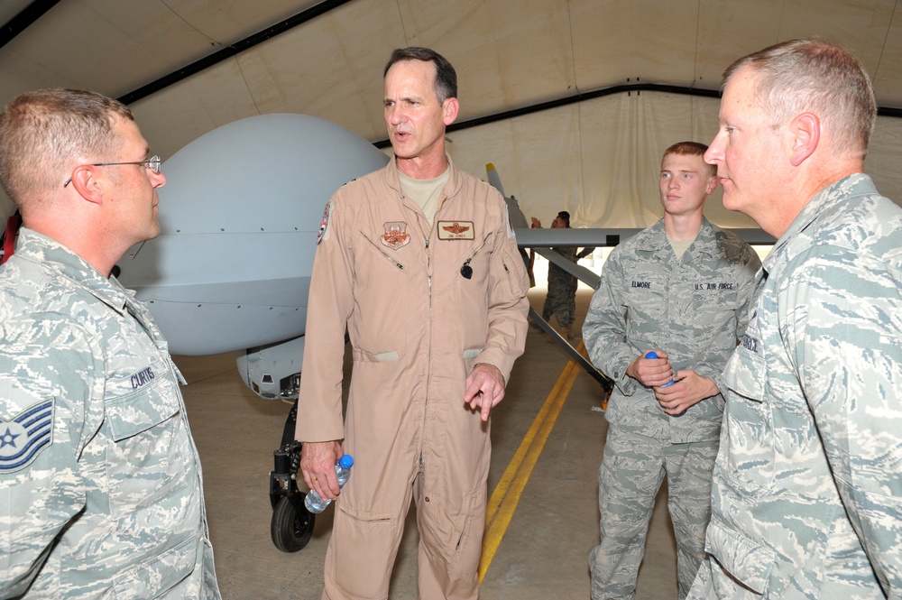 Maj. Gen. Jim Jones tours an undisclosed location in Southwest Asia