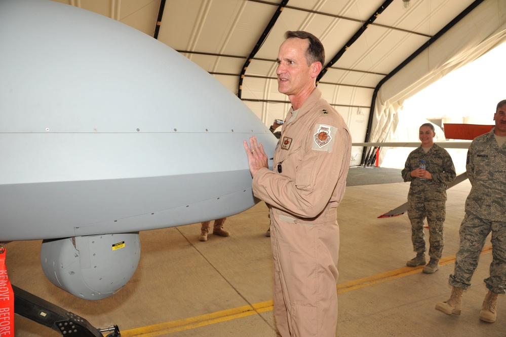 Maj. Gen. Jim Jones tours an undisclosed location in Southwest Asia