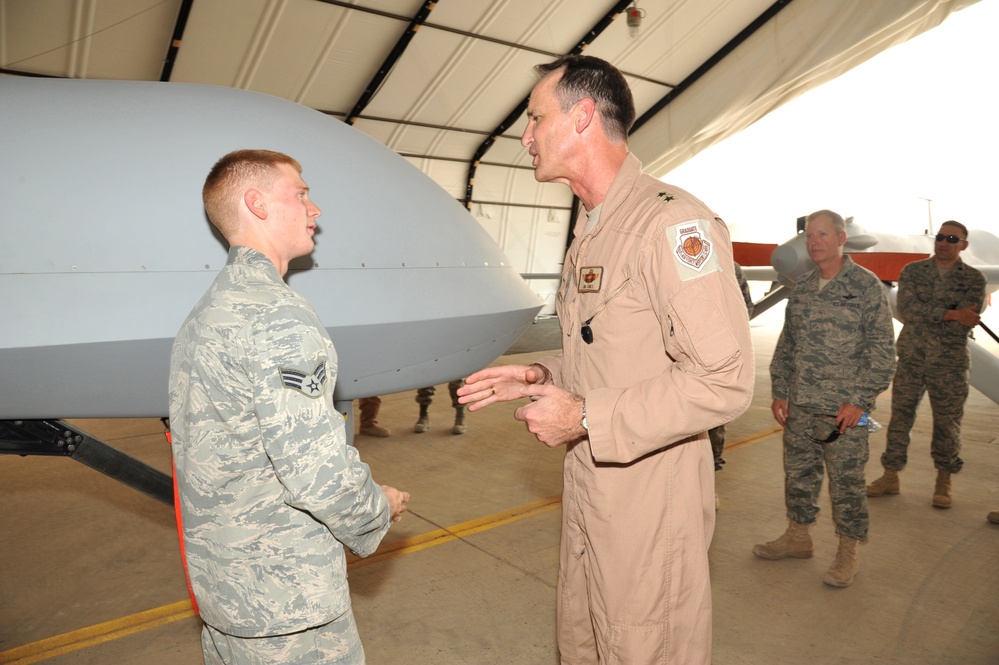 Maj. Gen. Jim Jones tours an undisclosed location in Southwest Asia